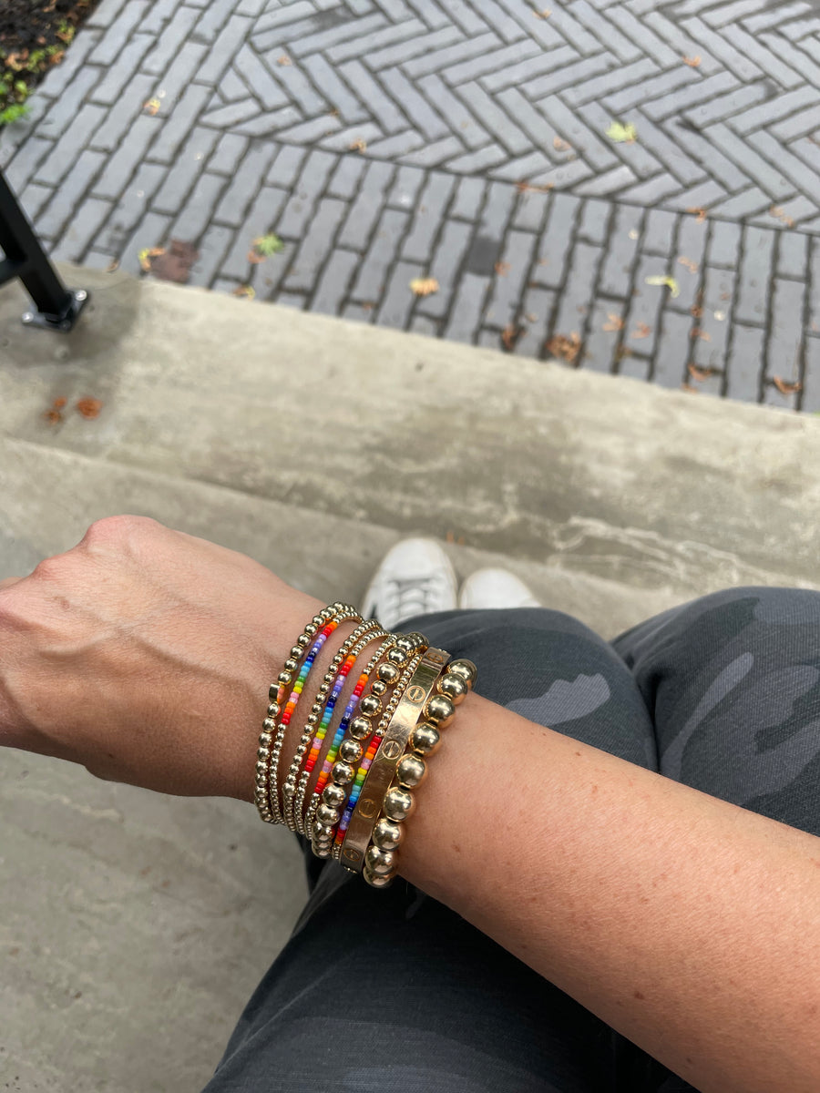 Rainbow stack including the 22 bracelet for Jordana's Rainbows. $22 from the sale of each bracelet will go directly to the Jordana's Rainbows Foundation to fund research to fight DIPG 