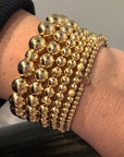 Size Guide - 14K gold filled stretch from right to left: 3mm, 4mm, 5mm, 6mm, 8mm, 10mm. Gold filled heart bead available
