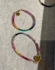 Two multi stone rainbow bracelets with clasp.