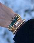 JRD 6mm 14k gold filled bracelet with opaque green Swarovski crystal beads.