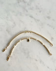 3mm 14k gold filled bracelet with three hearts and clasp and 3mm 14k gold filled bracelet with small pearls, "R" initial charm and clasp.