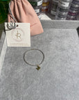 3mm sterling silver bracelet with 14k gold filled initial charm.