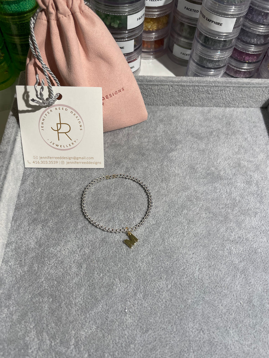 3mm sterling silver bracelet with 14k gold filled initial charm.