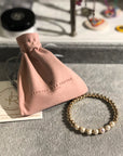 5mm 14k gold filled bracelet with fresh water pearls and rondelles.