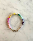 Vibrant multi coloured smooth gemstone bracelet with clasp.