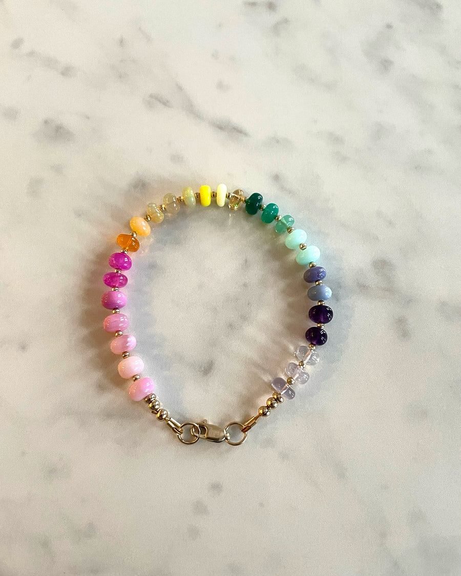 Vibrant multi coloured smooth gemstone bracelet with clasp.
