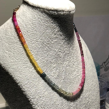 The 'Tsissi' necklace named for Tsissi Missoni is a made to order rainbow of all natural 14" faceted precious stones. Can be made longer on request.